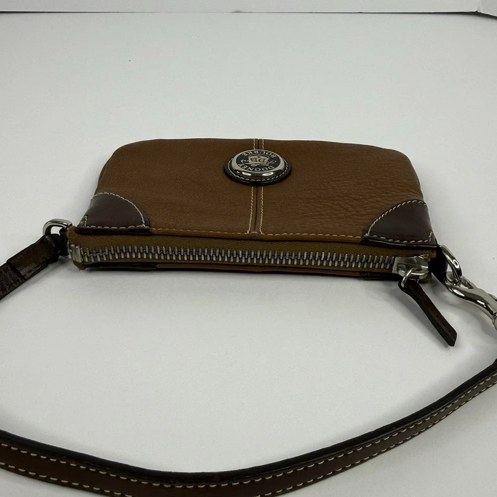 Dooney & Bourke Brown Pebble Leather Wristlet Medallion Logo Zipper
